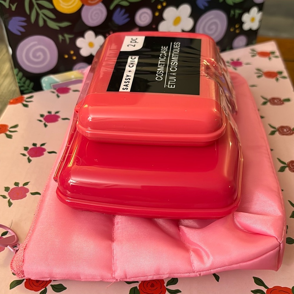 Two Small size cosmetic cases plus free zipper bag